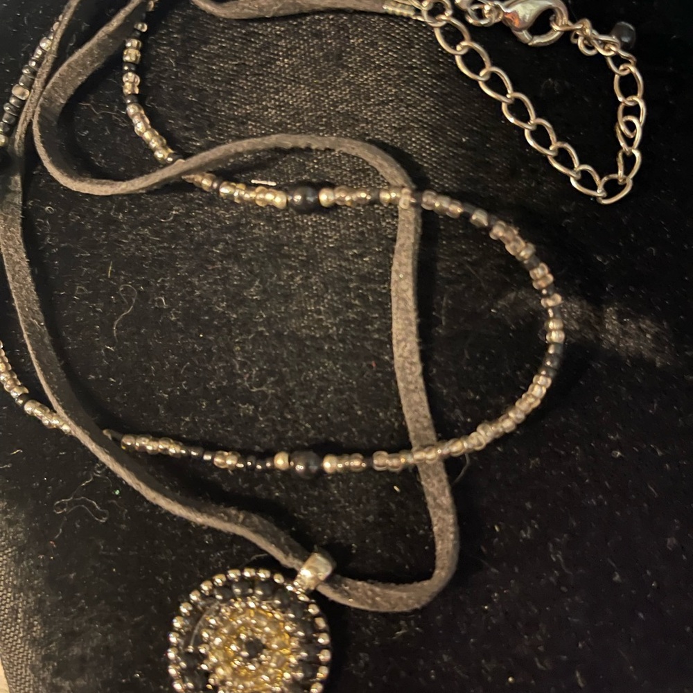 Avon Black and Gold Beaded Suede Pendant Necklace